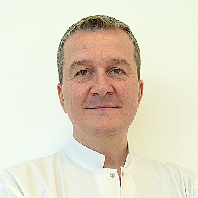 Dr. Marius Catană