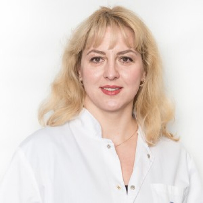 Dr. Roxana Feidoc